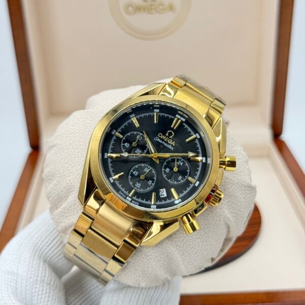gold‑tone Omega Seamaster Aqua Terra chronograph with black dial
